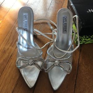 PVC ankle strap heels with bow front